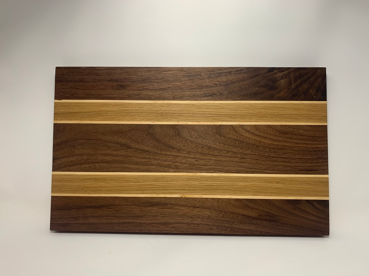 Handmade Walnut Cutting Board with Oak and Maple Stripes